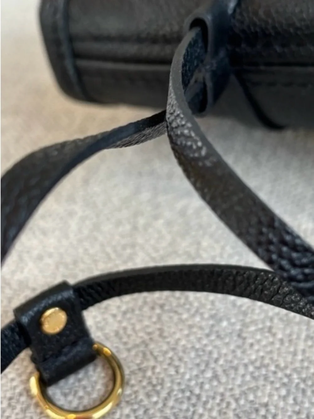 Louis Vuitton Black Embossed Monogram never fall MM with Pouch